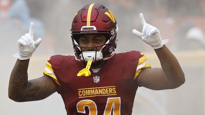 Sep 24, 2023; Landover, Maryland, USA; Washington Commanders running back Antonio Gibson (24) runs not the field prior to the game against the Buffalo Bills at FedExField. Mandatory Credit: Geoff Burke-USA TODAY Sports