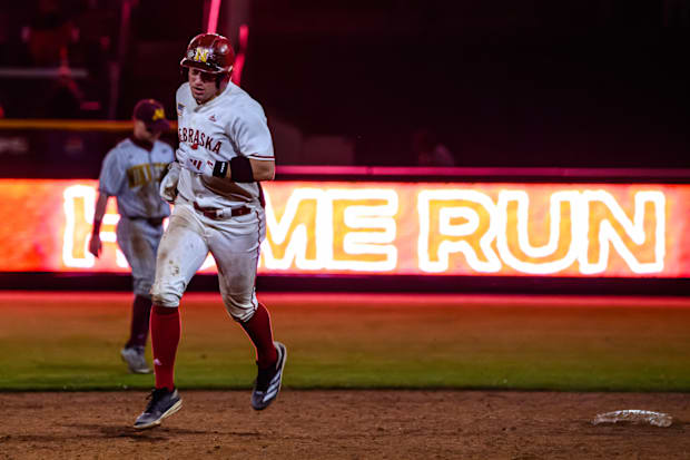 Joshua Overbeek rounds the bases after his homer. 