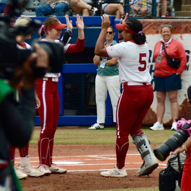 Oklahoma slugger Ella Parker is introduced with a protective boot on her right foot at the 2025 WCWS.