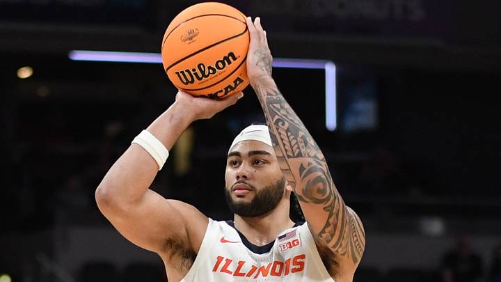 Mar 13, 2025; Indianapolis, IN, USA; Illinois Fighting Illini guard Kylan Boswell (4) shoots during the first half against the Iowa Hawkeyes at Gainbridge Fieldhouse. Mandatory Credit: Robert Goddin-Imagn Images