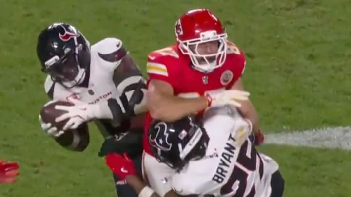 Travis Kelce took a huge hit after losing the ball against the Texans. Travis Kelce took a huge hit after losing the ball against the Texans.