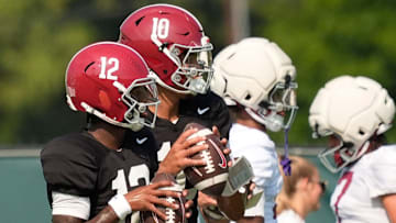Quarterbacks Keelon Russell and Austin Mack throw during practice for the Alabama Crimson Tide.