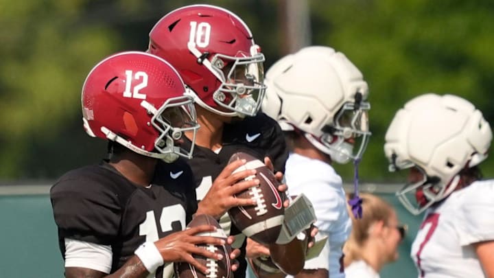 Aug. 19, 2025, Tuscaloosa, AL; Quarterbacks Keelon Russell and Austin Mack throw during practice for the Alabama Crimson Tide.