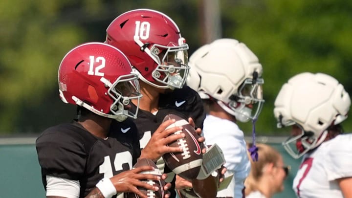 Aug. 19, 2025, Tuscaloosa, AL; Quarterbacks Keelon Russell and Austin Mack throw during practice for the Alabama Crimson Tide.
