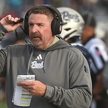 Nevada’s Jeff Choate coaches in his first game for the Wolf Pack while taking on SMU at Mackay Stadium in Reno on Aug. 24, 2024.