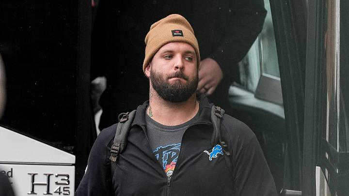 Detroit Lions offensive tackle Taylor Decker (68) walks off the bus as the team arrive at Lambeau Field in Green Bay, Wis. on Sunday, Nov. 3, 2024.