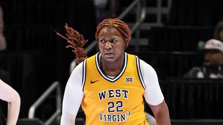 Mar 7, 2026; Kansas City, MO, USA;  West Virginia Mountaineers forward Kierra Wheeler (22) celebrates a score during the first half at T-Mobile Center. Mandatory Credit: Nick Tre. Smith-Imagn Images