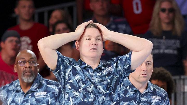 Nov 29, 2024; Paradise Island, Bahamas, BHS;  Arizona Wildcats head coach Tommy Lloyd reacts against the West Virginia Mountaineers during overtime at Imperial Arena at the Atlantis resort.  Mandatory Credit: Kevin Jairaj-Imagn Images