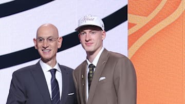 Jun 25, 2025; Brooklyn, NY, USA;  Kasparas Jakucionis stands with NBA commissioner Adam Silver after being selected as the 20th pick by the Miami Heat in the first round of the 2025 NBA Draft at Barclays Center. Mandatory Credit: Brad Penner-Imagn Images