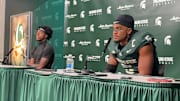 Michigan State quarterback Aidan Chiles (left) and linebacker Jordan Hall (right) speak after a 31-20 loss to Michigan on Oct. 25, 2025.