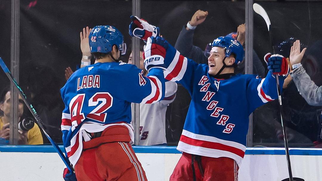 Apr 5, 2026; New York, New York, USA; New York Rangers left wing Adam Sykora (38) celebrates his goal with center Noah Laba (42) during the second period against the Washington Capitals at Madison Square Garden. Apr 5, 2026; New York, New York, USA; New York Rangers left wing Adam Sykora (38) celebrates his goal with center Noah Laba (42) during the second period against the Washington Capitals at Madison Square Garden.