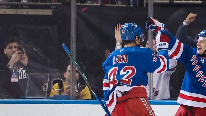 Apr 5, 2026; New York, New York, USA; New York Rangers left wing Adam Sykora (38) celebrates his goal with center Noah Laba (42) during the second period against the Washington Capitals at Madison Square Garden. Apr 5, 2026; New York, New York, USA; New York Rangers left wing Adam Sykora (38) celebrates his goal with center Noah Laba (42) during the second period against the Washington Capitals at Madison Square Garden.
