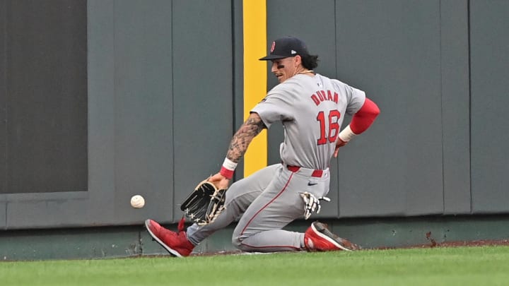 Boston Red Sox left fielder Jarren Duran (16) fields a ball in the outfield in the second inning against the Kansas City Royals at Kauffman Stadium on Aug 5.