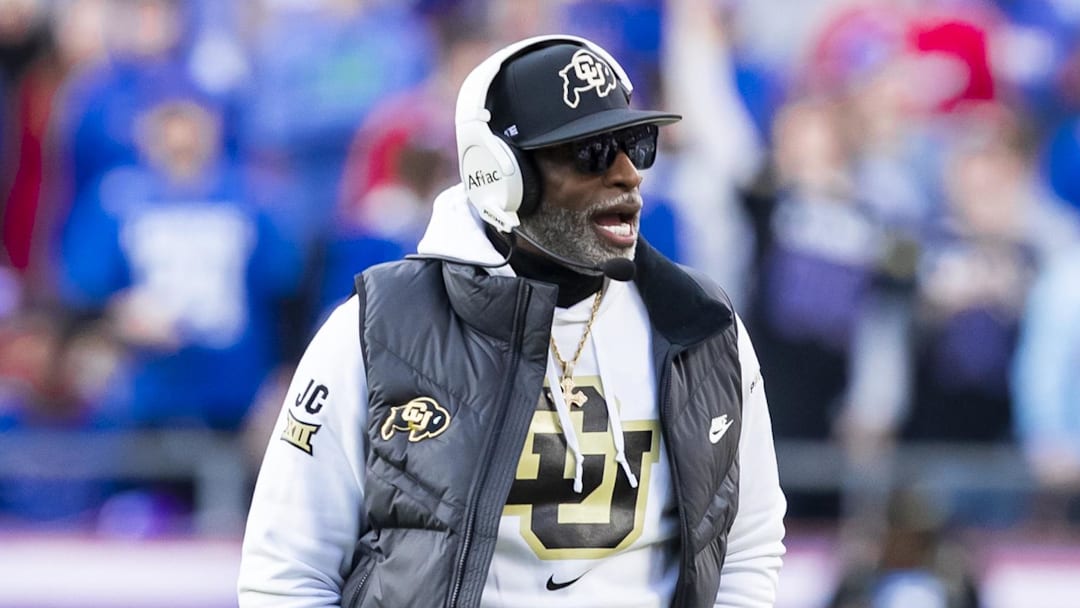Nov 23, 2024; Kansas City, Missouri, USA;  Colorado head coach Deion Sanders paces the field during the 2nd quarter between the Kansas Jayhawks and the Colorado Buffaloes at GEHA Field at Arrowhead Stadium.
