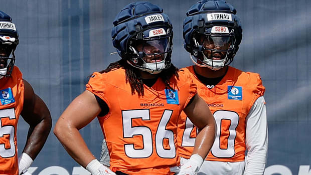 Denver Broncos linebacker Jordan Turner (55) and linebacker Levelle Bailey (56) and linebacker Justin Strnad (40).