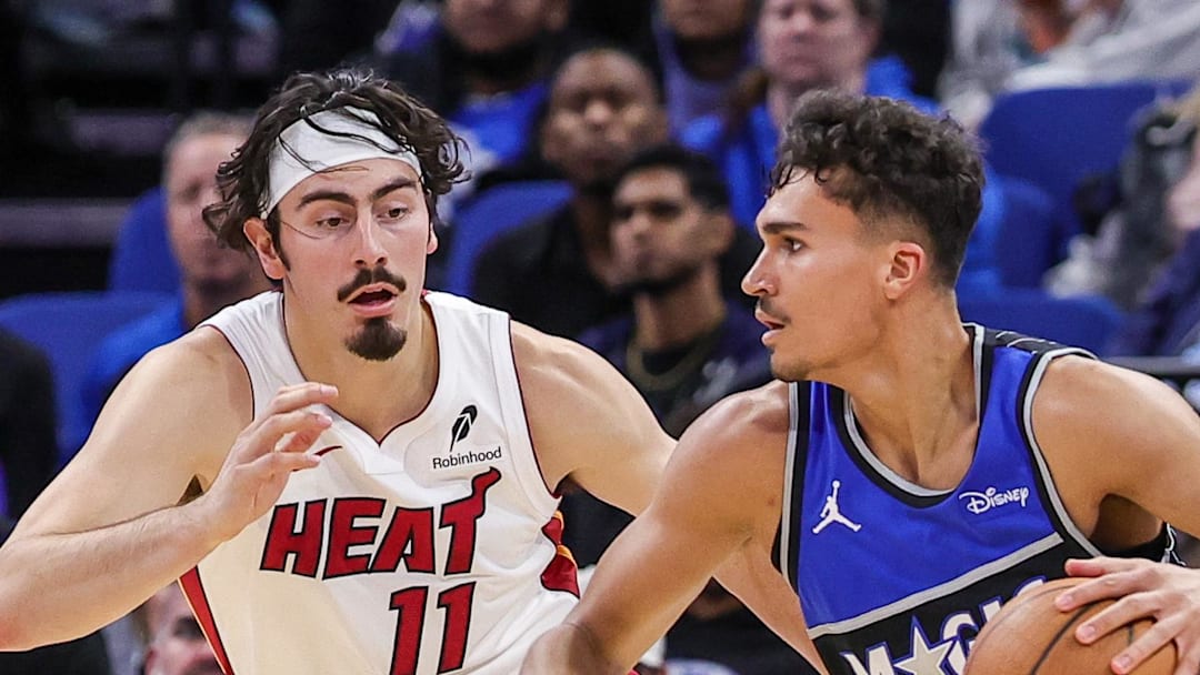 Orlando Magic forward Tristan da Silva drives past Miami Heat forward Jaime Jaquez Jr. Orlando Magic forward Tristan da Silva drives past Miami Heat forward Jaime Jaquez Jr.
