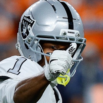 Nov 6, 2025; Denver, Colorado, USA; Las Vegas Raiders wide receiver Tre Tucker (1) gestures at the line of scrimmage in the fourth quarter against the Denver Broncos at Empower Field at Mile High. Mandatory Credit: Isaiah J. Downing-Imagn Images