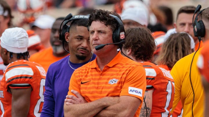 Aug 31, 2024; Stillwater, Oklahoma, USA; Oklahoma State Cowboys coach Mike Gundy on the sidelines during the fourth quarter against the South Dakota State Jackrabbits at Boone Pickens Stadium. Mandatory Credit: William Purnell-USA TODAY Sports