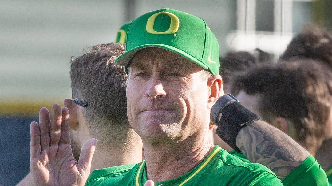 Oregon baseball coach Mark Wasikowski joins his team before their home opener against the Lafayette Leopards at PK Park in Eugene Friday, Feb. 23, 2024.
