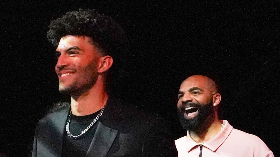 May 10, 2026; Chicago, IL, USA; Duke’s Cameron Boozer  walks in with his father Carlos Boozer during the 2026 NBA Draft Lottery at Navy Pier. Mandatory Credit: David Banks-Imagn Images