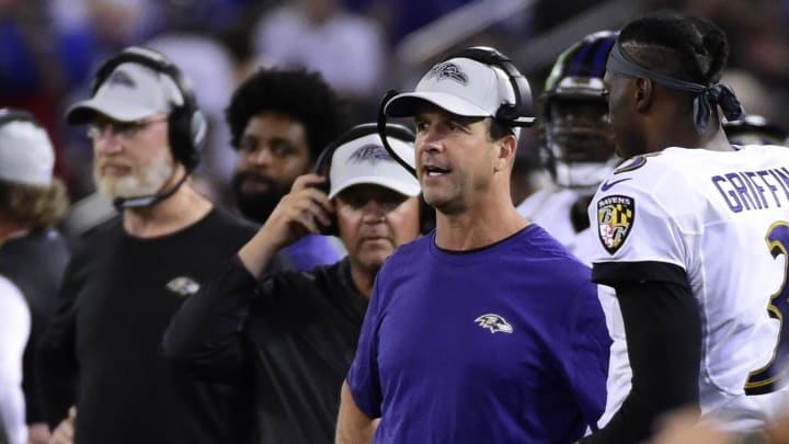 Aug 30, 2018; Baltimore, MD, USA;  Baltimore Ravens head coach John Harbaugh speaks with quarterback Robert Griffin III (3) during the second quarter against the Washington Redskins at M&T Bank Stadium. Mandatory Credit: Tommy Gilligan-USA TODAY Sports