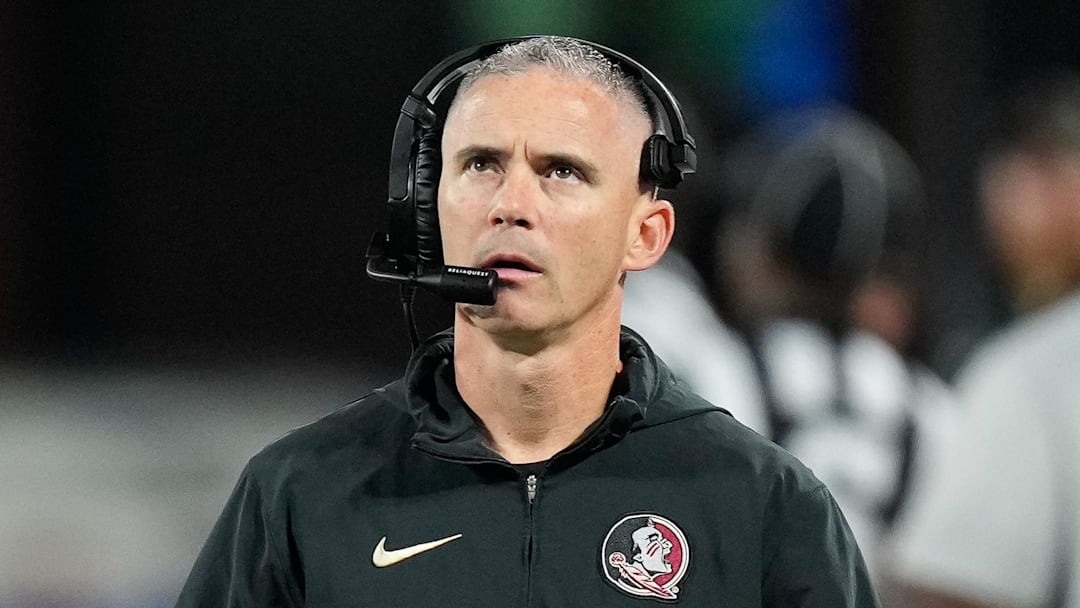 Dec 2, 2023; Charlotte, NC, USA;  Florida State Seminoles head coach Mike Norvell walks the sidelines during the third quarter against the Louisville Cardinals at Bank of America Stadium. Mandatory Credit: Jim Dedmon-Imagn Images