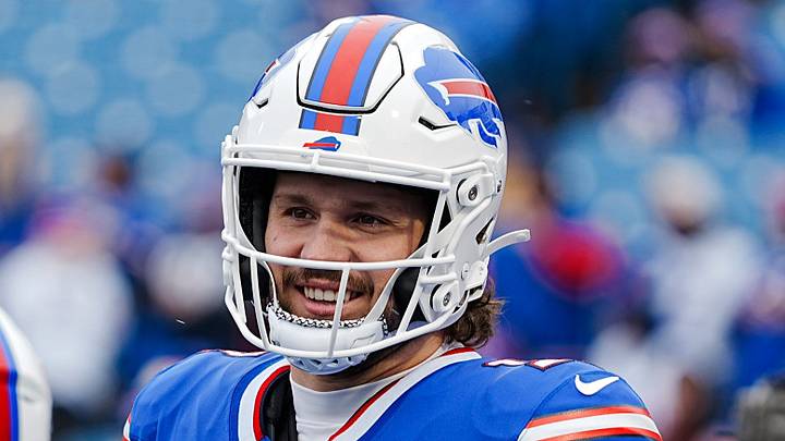 Buffalo Bills quarterback Josh Allen (17) smiles at something someone said before the Buffalo Bills wild card game against the Denver Broncos at Highmark Stadium in Orchard Park on Jan. 12, 2025.