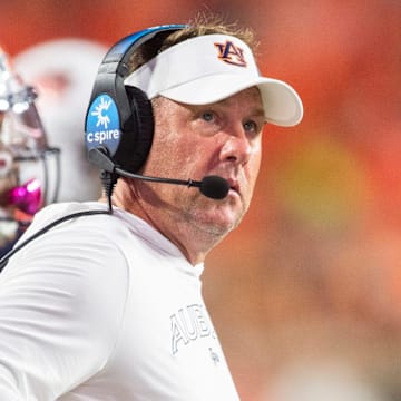 Auburn head coach Hugh Freeze stands on the sidelines during a game.