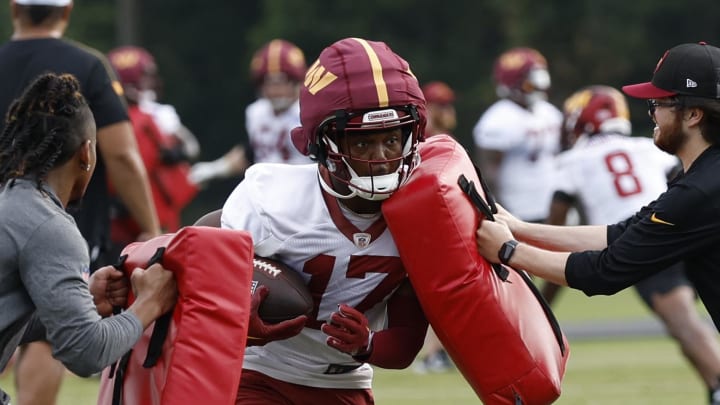 Jul 25, 2024; Ashburn, VA, USA; Washington Commanders wide receiver Terry McLaurin (17) carries a ball during drills on day two of Commanders training camp at OrthoVirginia Training Center at Commanders Park. Mandatory Credit: Geoff Burke-USA TODAY Sports