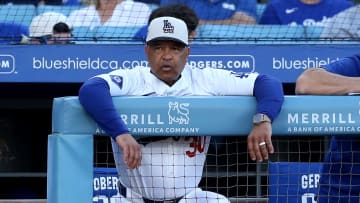 Jul 4, 2024; Los Angeles, California, USA; Los Angeles Dodgers manager Dave Roberts (30) during the first inning against the Arizona Diamondbacks at Dodger Stadium. Mandatory Credit: Jason Parkhurst-USA TODAY Sports