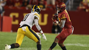 Sep 14, 2019; Ames, IA, USA; Iowa Hawkeyes defensive back Michael Ojemudia (11) looks to tackle Iowa State Cyclones wide receiver Darren Wilson (17) at Jack Trice Stadium. Iowa beat Iowa State 18-17.  Mandatory Credit: Reese Strickland-Imagn Images