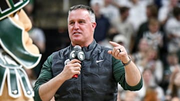 Michigan State's new football coach Pat Fitzgerald addresses the crowd during a timeout in the first half of the Spartans basketball game against Iowa on Tuesday, Dec. 2, 2025, at the Breslin Center in East Lansing.