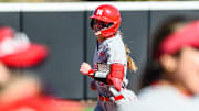 Jordy Bahl smiles as she runs the bases after a two-run homer.