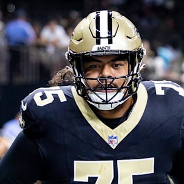Aug 25, 2024; New Orleans, Louisiana, USA;  New Orleans Saints offensive tackle Taliese Fuaga (75) during the warmups before the game against the Tennessee Titans at Caesars Superdome. Mandatory Credit: Stephen Lew-Imagn Images
