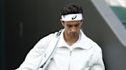 Lorenzo Musetti debuts a Bottega Veneta jacket for his first round match at Wimbledon.