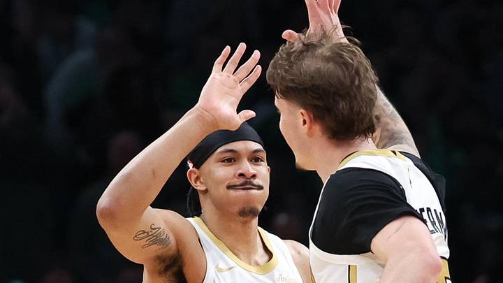Apr 12, 2026; Boston, Massachusetts, USA; Boston Celtics forward Ron Harper Jr (13) and Boston Celtics guard Baylor Scheierman (55) celebrate during the second half against the Orlando Magic at TD Garden. Mandatory Credit: Paul Rutherford-Imagn Images