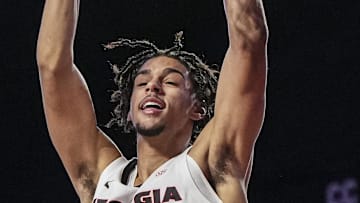 Dec 29, 2024; Athens, Georgia, USA; Georgia Bulldogs forward Asa Newell (14) dunks against the South Carolina State Bulldogs during the second half at Stegeman Coliseum. Mandatory Credit: Dale Zanine-Imagn Images
