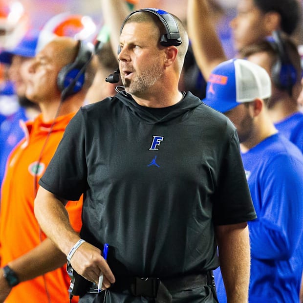 Florida Gators head coach Billy Napier coaches from the sidelines during the second half at Ben Hill Griffin Stadium.