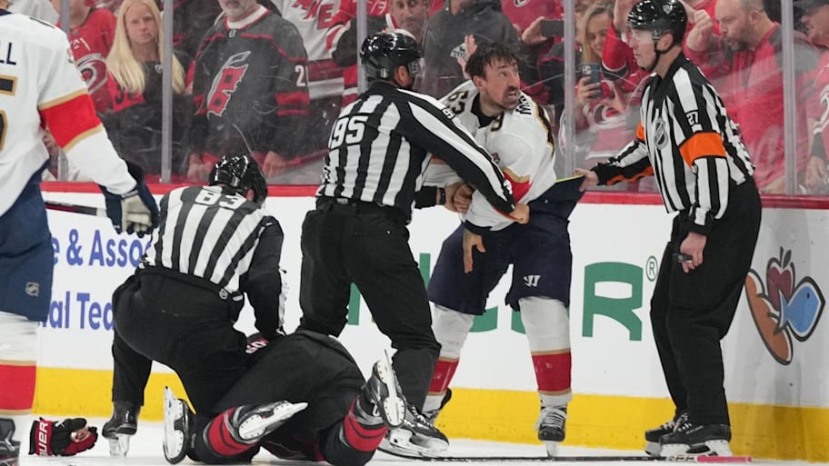 Florida Panthers forward Brad Marchand fights Carolina Hurricanes defenseman Shayne Gostibehere | James Guillory-Imagn Images