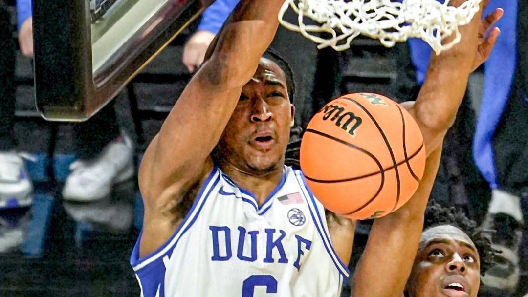 Duke Blue Devils forward Maliq Brown (6) dunks near TCU Horned Frogs guard Jayden Pierre (1) March 21, 2026 during the second half of the NCAA Men’s Basketball Tournament second round East Region game at the Bon Secours Wellness Arena in Greenville, South Carolina.