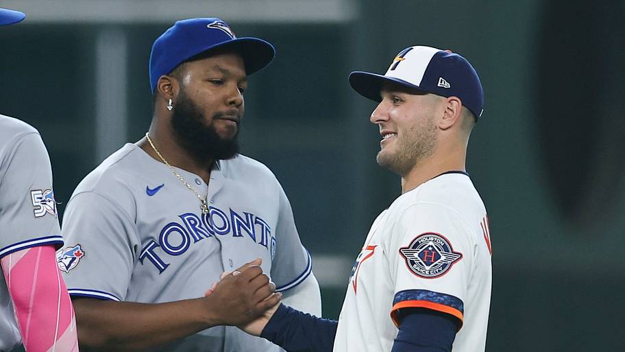 Daulton Varsho, right, caught up with some of his former Blue Jays teammates