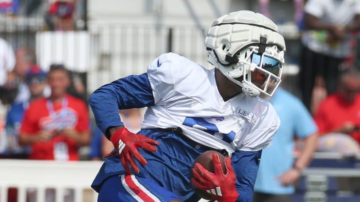 Bills wide receiver Marquez Valdes-Scantling pulls in a pass and races upfield during route drills.