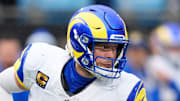 Nov 30, 2025; Charlotte, North Carolina, USA; Los Angeles Rams quarterback Matthew Stafford (9) hands the ball off to Los Angeles Rams running back Kyren Williams (23) during the fourth quarter against the Carolina Panthers at Bank of America Stadium. Mandatory Credit: Jim Dedmon-Imagn Images