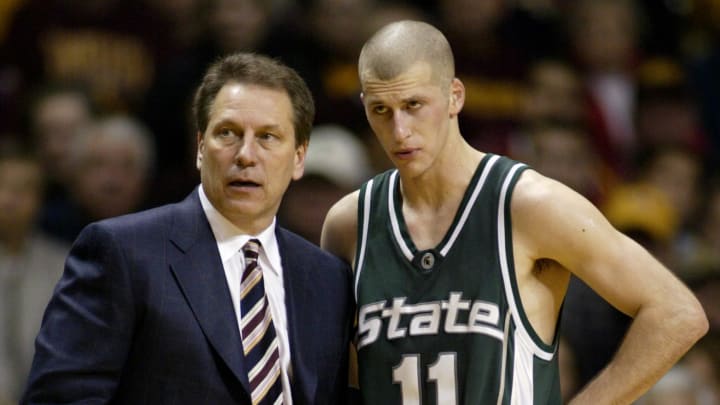 Feb 11, 2006; Minneapolis, MN, USA; Michigan State Spartans head coach Tom Izzo talks to guard (11) Drew Neitzel after he fouled out of the game against the Minnesota Gophers  at Williams Arena.  Mandatory Credit: Photo By Bruce Kluckhohn-USA TODAY Sports Copyright (c) 2005 Bruce Kluckhohn
