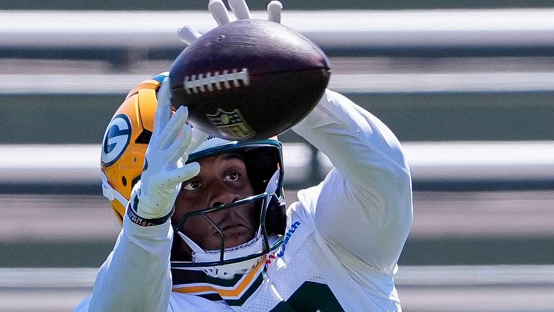 Green Bay Packers running back MarShawn Lloyd catches a pass during OTAs on June 2.