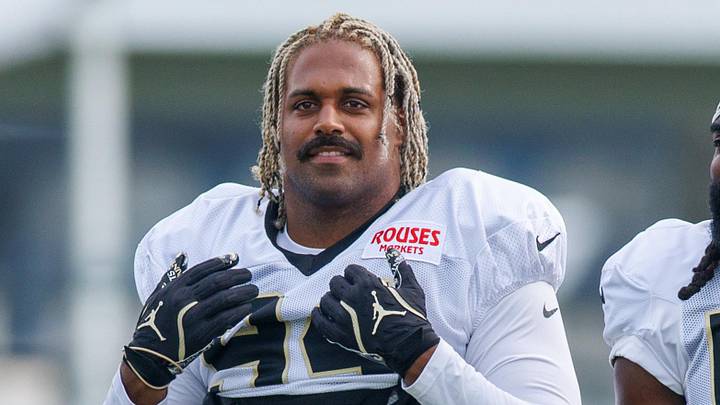 Jul 30, 2025; New Orleans, LA, USA;  New Orleans Saints defensive end Cameron Jordan (94) and linebacker Demario Davis (56) during training camp at Ochsner Sports Performance Center. Mandatory Credit: Stephen Lew-Imagn Images