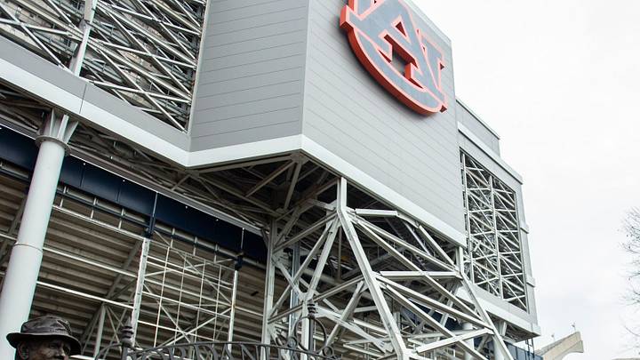 Auburn athletic director John Cohen introduces newly hired Auburn football head coach Alex Golesh at Jordan-Hare Stadium in Auburn, Ala. on Monday, Dec. 1, 2025.