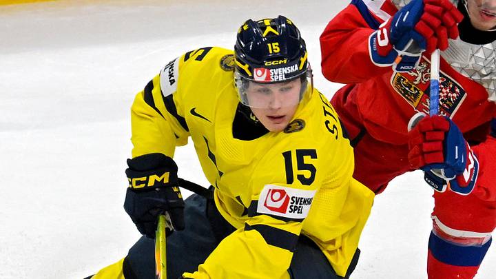 Jan 5, 2026; St. Paul, Minnesota, USA; Sweden forward Ivar Stenberg (15) controls the puck as Czechia defensemen Radim Mrtka (6) gives chase during the first period in the final of the 2026 IIHF World Junior Championship ice hockey tournament at Grand Casino Arena. Mandatory Credit: Nick Wosika-Imagn Images