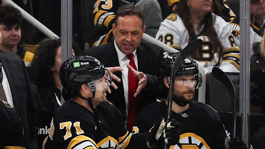 Oct 28, 2025; Boston, Massachusetts, USA; Boston Bruins head coach Marco Sturm talks with left wing Viktor Arvidsson (71) during the second period against the New York Islanders at TD Garden. Mandatory Credit: Winslow Townson-Imagn Images
