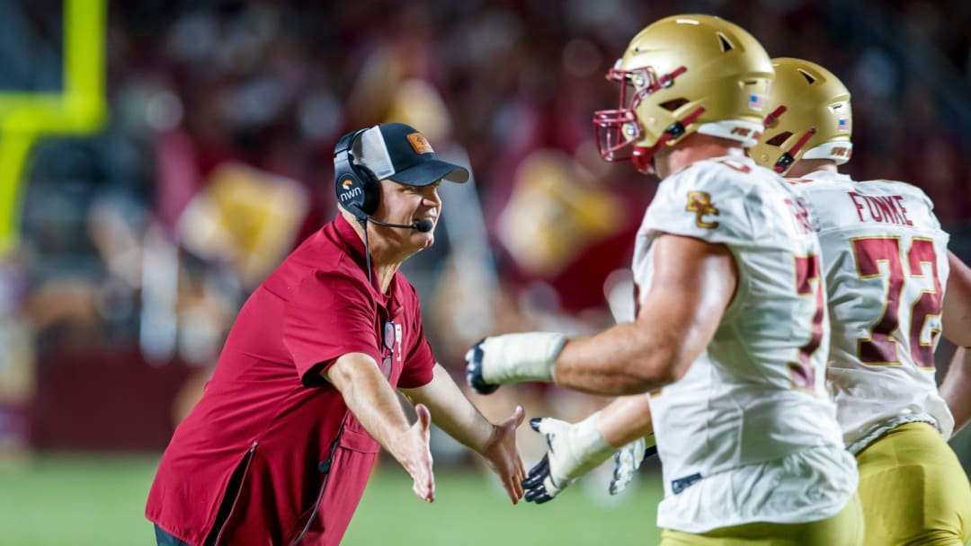 Boston College head coach Bill O’Brien congratulates players after his team scored their second touchdown of the first half against Florida State, Monday, Sept. 2, 2024, at Doak S. Campbell Stadium in Tallahassee, Fla. Mandatory Credit: AP Photo/Colin Hackley